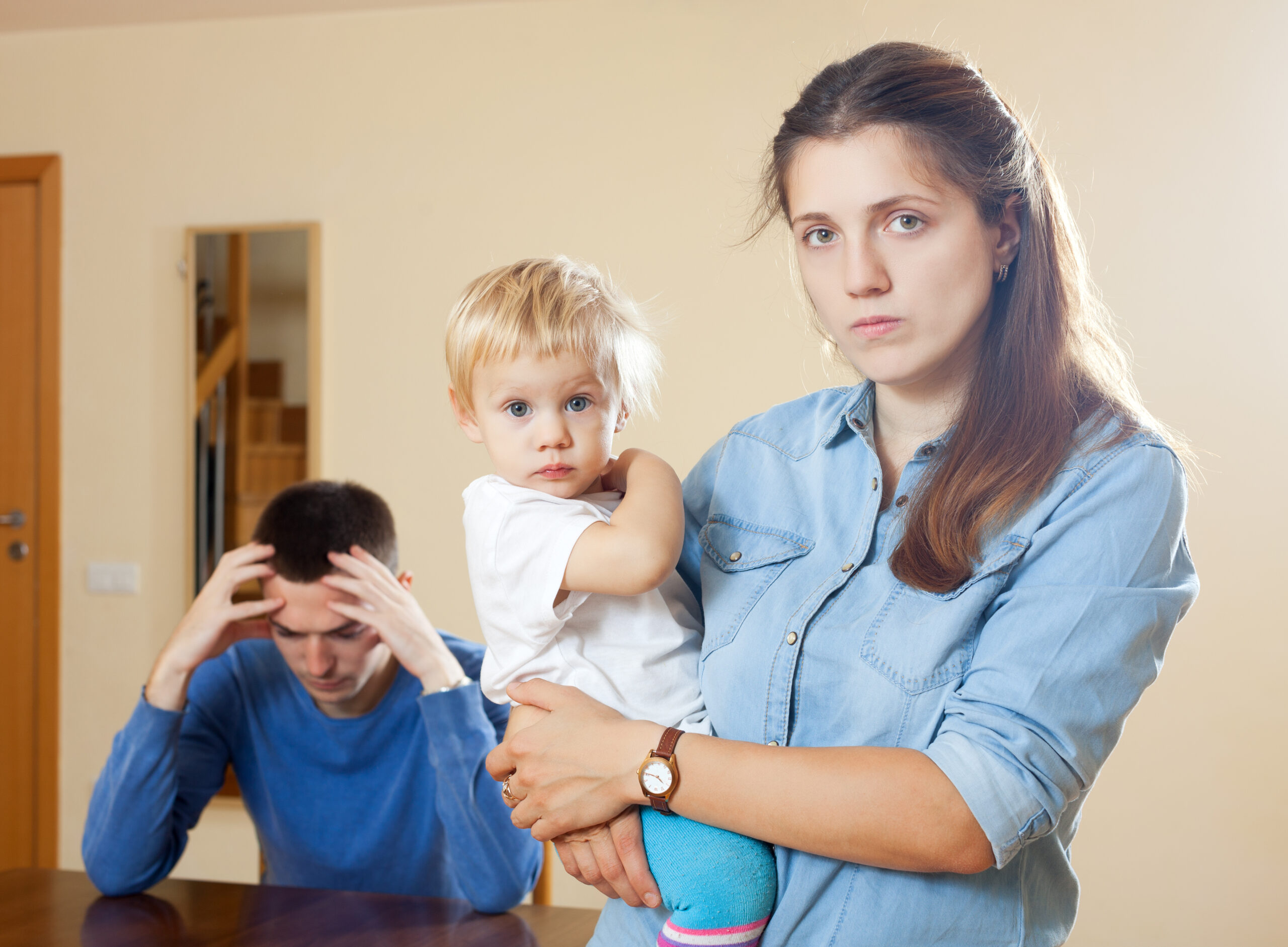 Family of three with child having conflict